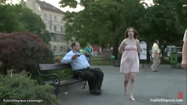 Pale British slave Crystal Sparx on knees with hands tied back gets ass whipped by Sandra Romain and James Deen outdoors in public