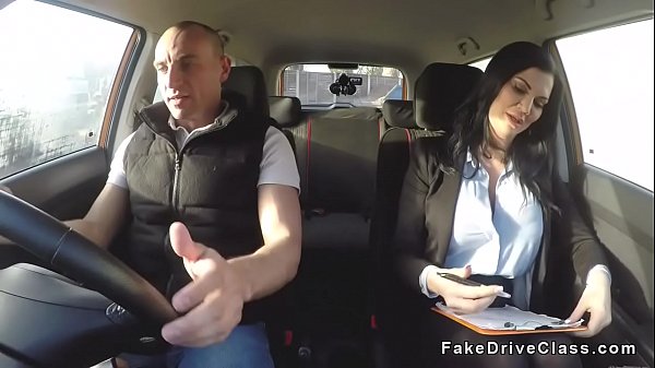 Muscular guy bangs huge tits brunette examiner in car in public