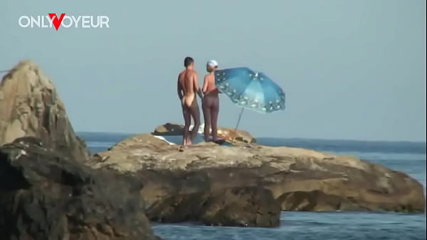 Beach Voyeur. Nude beach photo shoot ended with hardcore sex under the sun