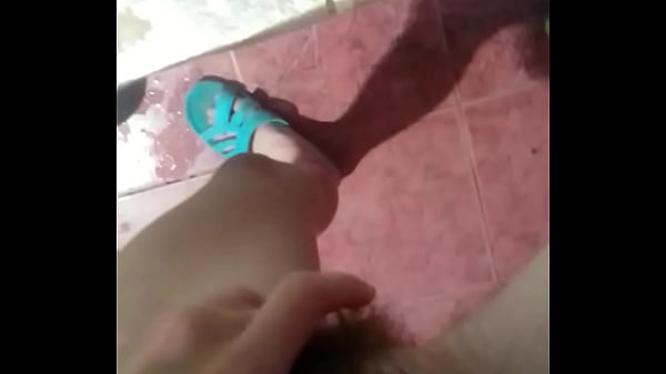I was visiting my neighbors and locked myself in the bathroom to jerk off my big hairy clitoris